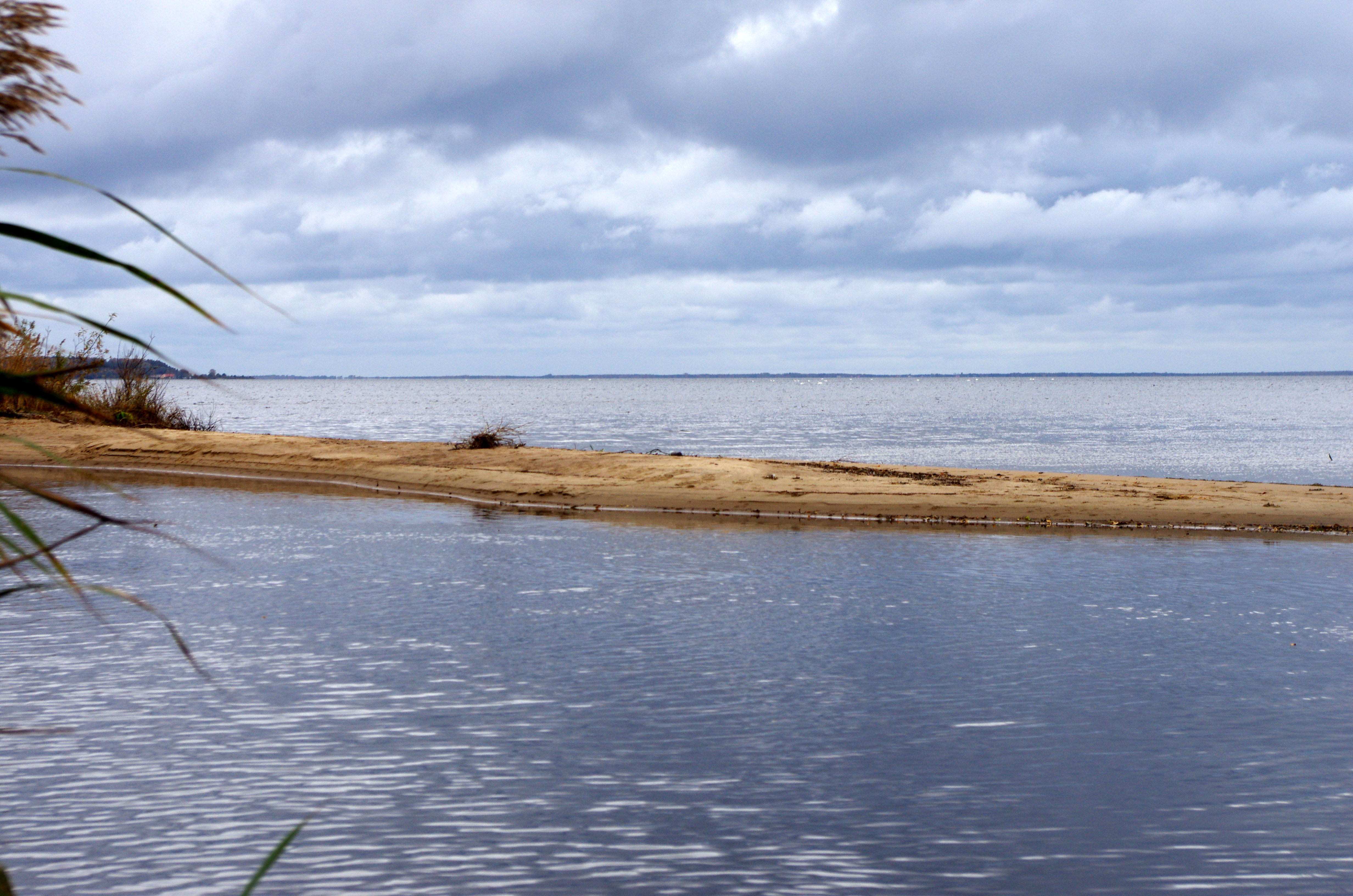 The photo shows sandbar at the mouth of the river to the Baltic Reda